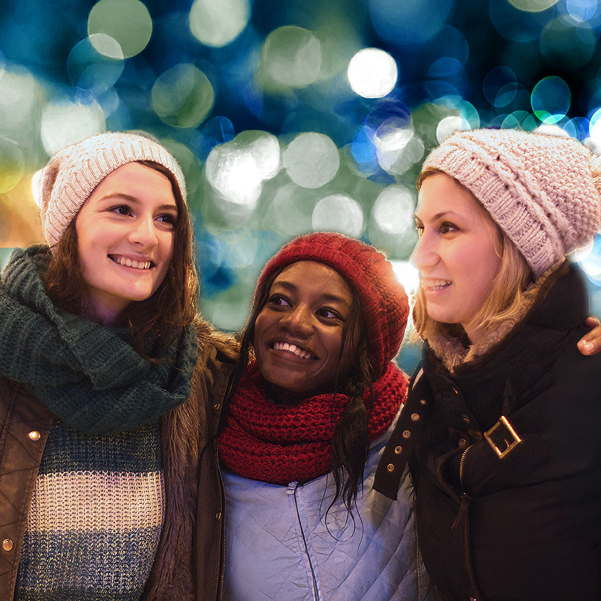 Group of friends surrounded by glowing blue lights