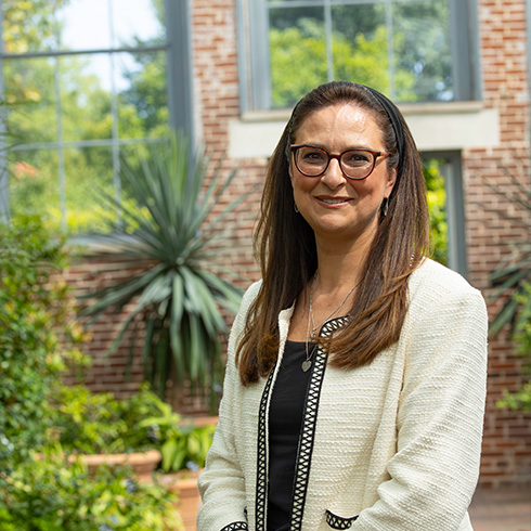 Dr. Lucia G. Lohmann inside the Linnean House conservatory